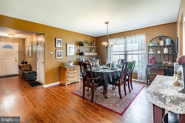 260 Shirley Ln, Pennsburg, PA 18073 - dining room featuring a chandelier, wood finished floors, and baseboards