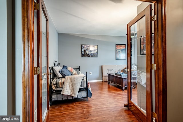 260 Shirley Ln, Pennsburg, PA 18073 - hall featuring french doors, wood finished floors, and baseboards