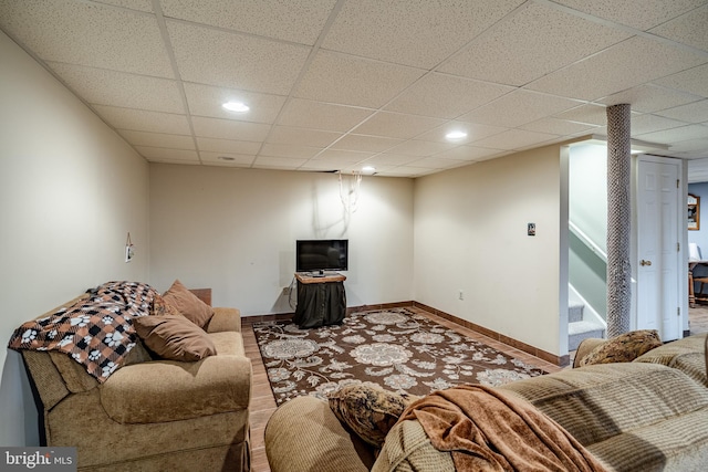 260 Shirley Ln, Pennsburg, PA 18073 - living room featuring stairway, baseboards, recessed lighting, wood finished floors, and a paneled ceiling