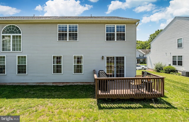 260 Shirley Ln, Pennsburg, PA 18073 - back of property with a wooden deck, a lawn, and central AC