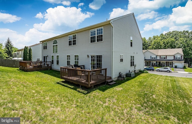 260 Shirley Ln, Pennsburg, PA 18073 - rear view of house featuring a wooden deck, a yard, and central AC unit