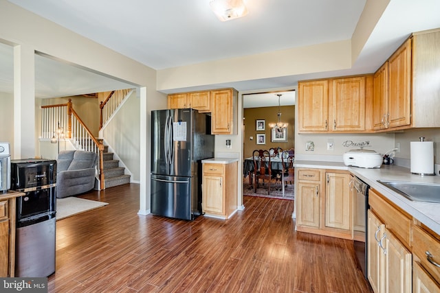 260 Shirley Ln, Pennsburg, PA 18073 - kitchen featuring freestanding refrigerator, dark wood finished floors, light countertops, dishwasher, and open floor plan