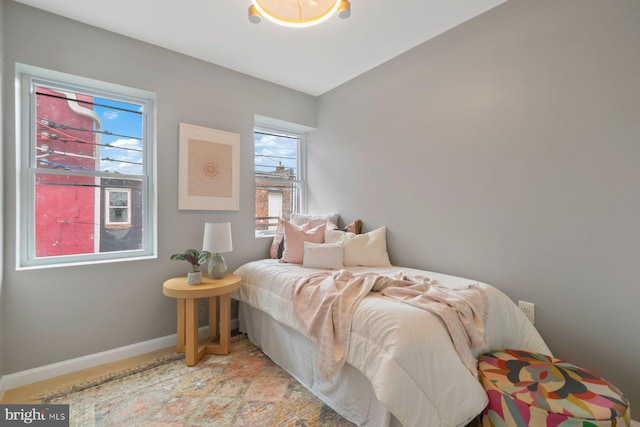 bedroom featuring baseboards