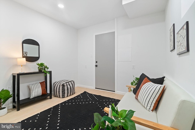 entryway featuring wood finished floors and baseboards