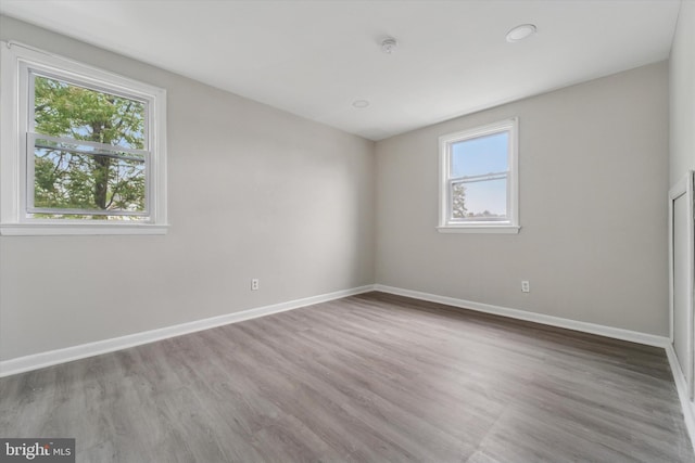 3819-3821 Garrett Rd, Drexel Hill, PA 19026 - empty room featuring plenty of natural light, baseboards, wood finished floors, and a smoke detector