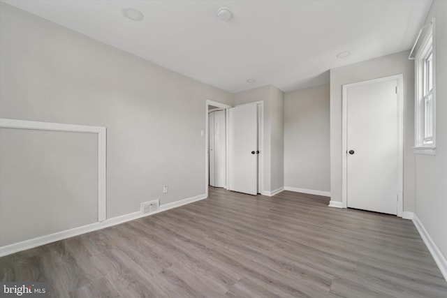3819-3821 Garrett Rd, Drexel Hill, PA 19026 - unfurnished bedroom featuring baseboards and wood finished floors