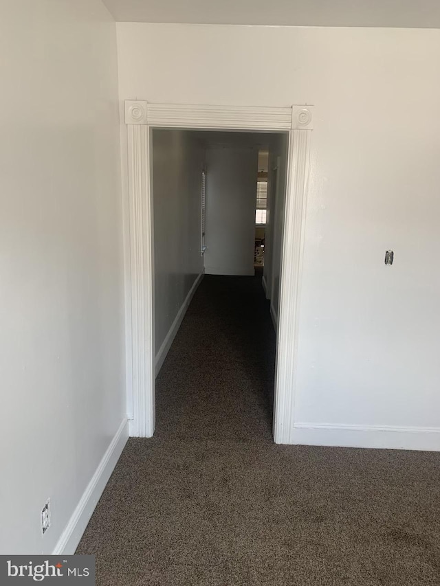314 W State St, Trenton, NJ 08618 - corridor featuring dark carpet and baseboards
