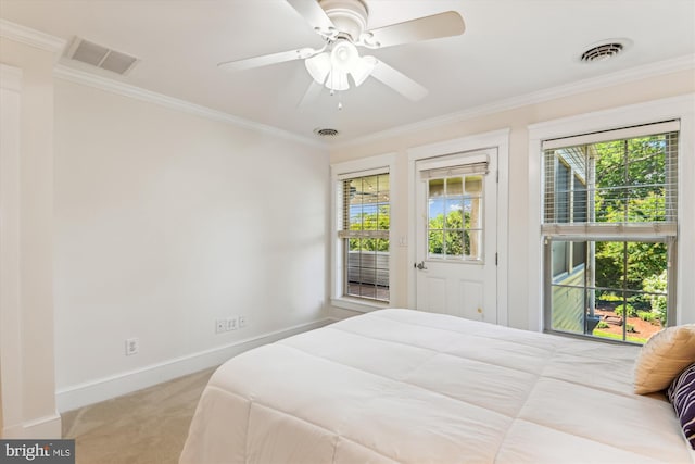 bedroom with ornamental molding, access to outside, multiple windows, baseboards, and carpet