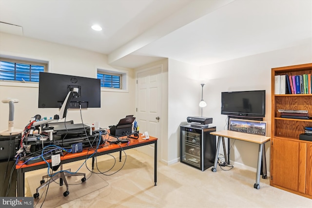 home office featuring carpet flooring and baseboards