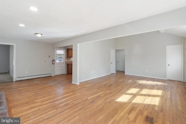 455 Commodore Dr, Forked River, NJ 08731 - unfurnished living room featuring baseboard heating, light wood finished floors, and recessed lighting