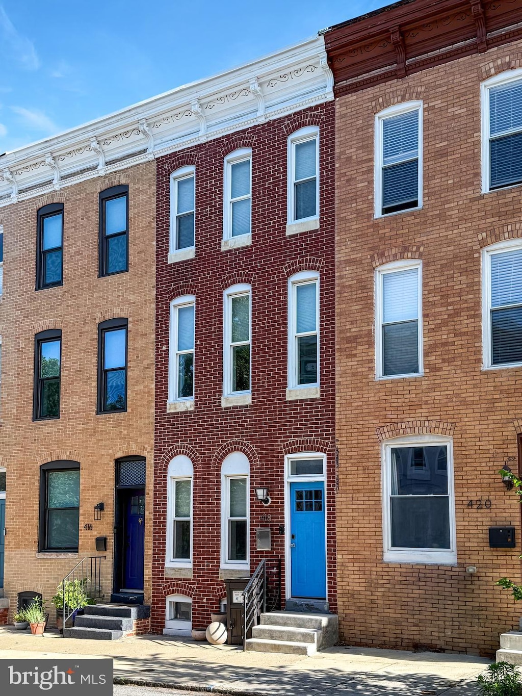 418 E Lanvale St, Baltimore, MD 21202 - multi unit property featuring entry steps and brick siding