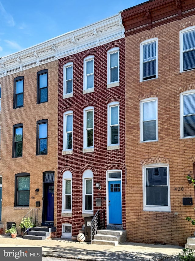 418 E Lanvale St, Baltimore, MD 21202 - multi unit property featuring entry steps and brick siding
