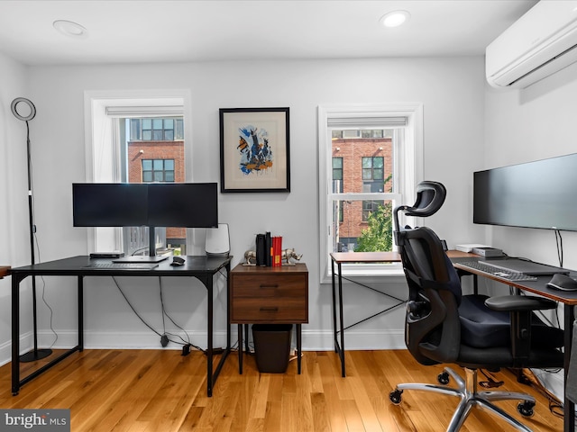 418 E Lanvale St, Baltimore, MD 21202 - office space featuring a wall mounted air conditioner, wood finished floors, baseboards, and recessed lighting