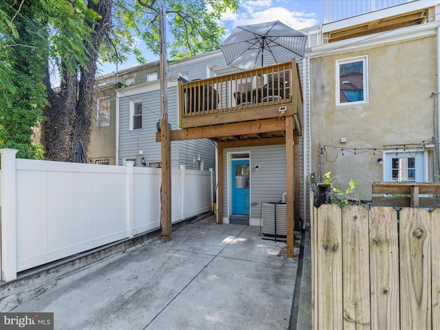 418 E Lanvale St, Baltimore, MD 21202 - rear view of house featuring a patio area