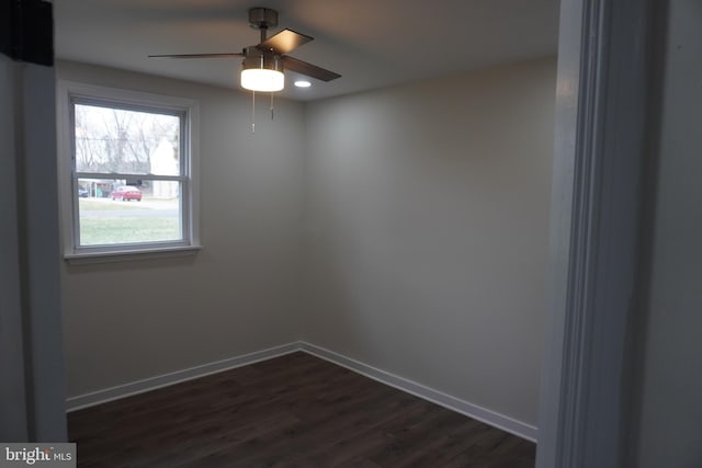 spare room with ceiling fan, dark wood-style flooring, baseboards, and recessed lighting