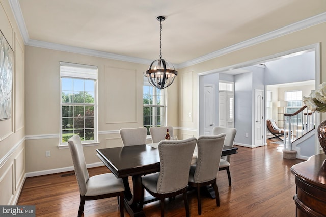 9609 Low Meadow Dr, Gaithersburg, MD 20882 - dining space with a chandelier, dark wood-style floors, and ornamental molding