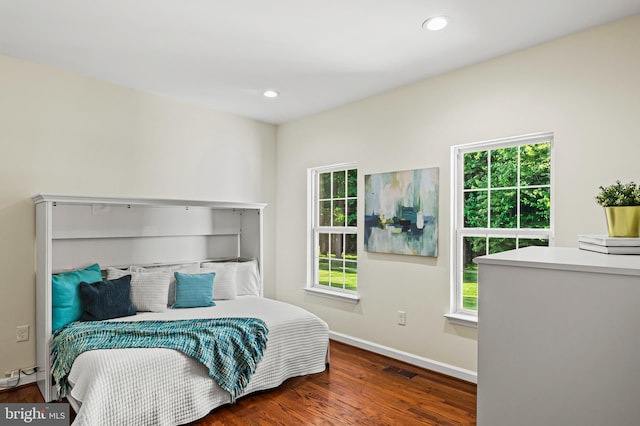 9609 Low Meadow Dr, Gaithersburg, MD 20882 - bedroom with multiple windows, wood finished floors, baseboards, and recessed lighting