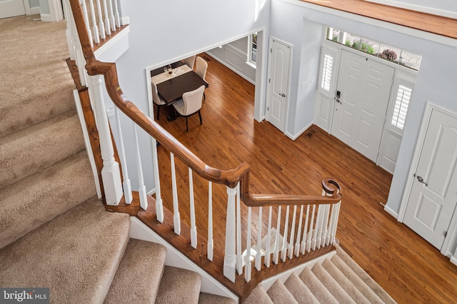 9609 Low Meadow Dr, Gaithersburg, MD 20882 - entrance foyer featuring stairway, wood finished floors, and baseboards