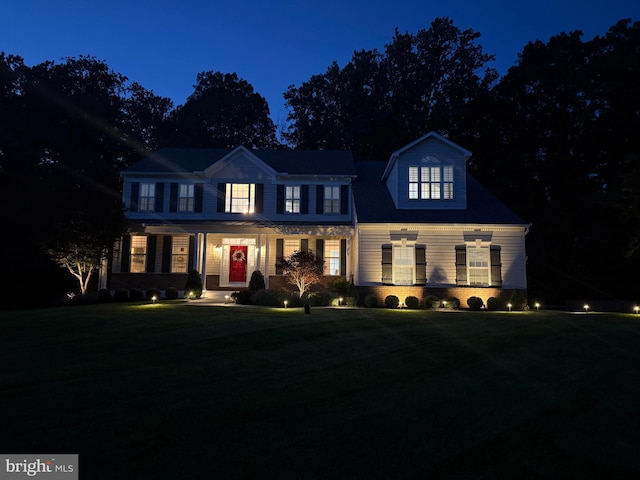 9609 Low Meadow Dr, Gaithersburg, MD 20882 - colonial-style house with covered porch and a yard