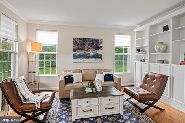 9609 Low Meadow Dr, Gaithersburg, MD 20882 - living area featuring wood finished floors, crown molding, plenty of natural light, and baseboards