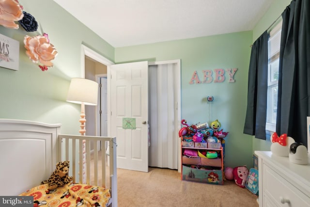 318 Spring Lake Blvd, Browns Mills, NJ 08015 - bedroom with light colored carpet and a nursery area