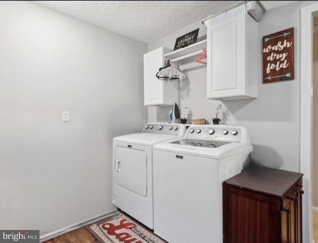 318 Spring Lake Blvd, Browns Mills, NJ 08015 - clothes washing area with independent washer and dryer, cabinet space, a textured ceiling, light wood-type flooring, and baseboards
