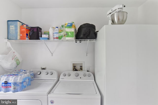 washroom featuring separate washer and dryer