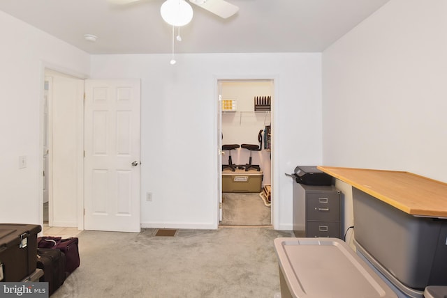 office with carpet, ceiling fan, and baseboards