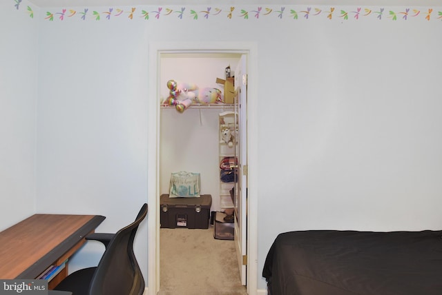 bedroom featuring carpet