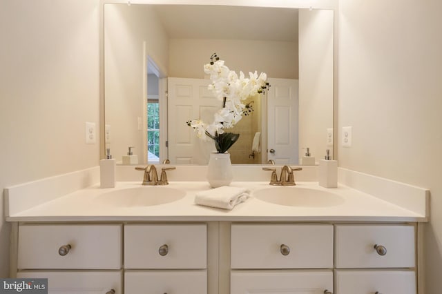 bathroom with double vanity