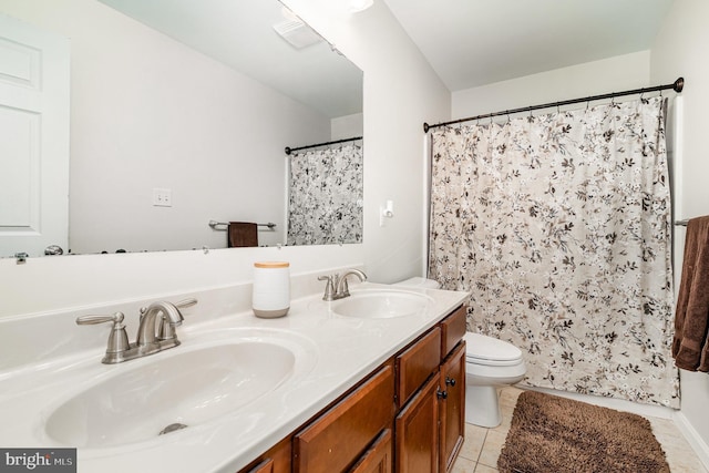 bathroom with tile patterned floors, double vanity, toilet, and a shower with shower curtain