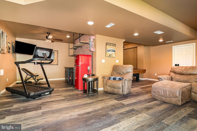 workout area featuring wood finished floors, baseboards, ceiling fan, and recessed lighting