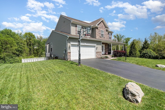 view of front of property with stone siding, driveway, an attached garage, and a porch