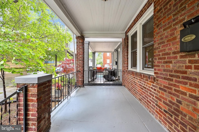 balcony featuring a porch