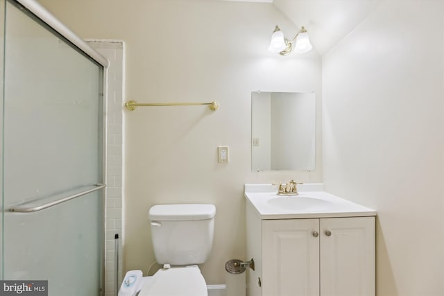 full bathroom with toilet, vanity, an enclosed shower, and lofted ceiling