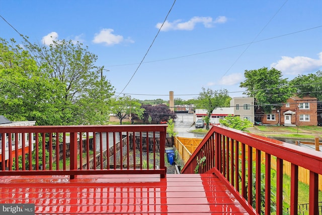 wooden deck featuring fence