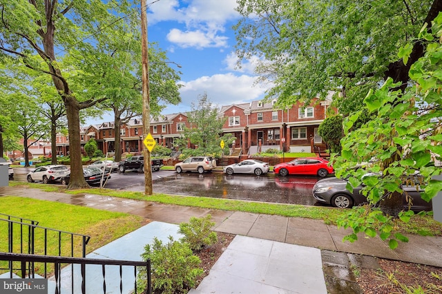 view of yard featuring a residential view