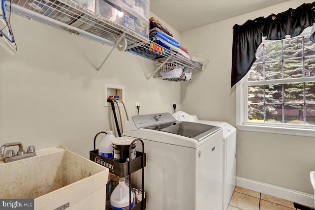 3202 Nash Rd, Reading, PA 19608 - washroom with washer and dryer, light tile patterned floors, and baseboards