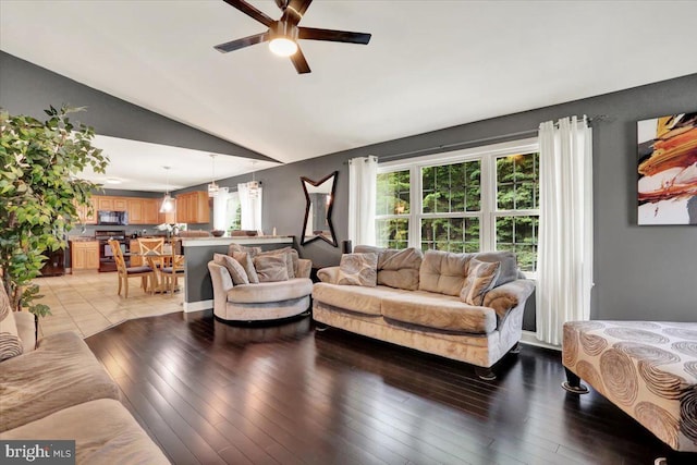 3202 Nash Rd, Reading, PA 19608 - living area with lofted ceiling, a ceiling fan, and light wood-style floors