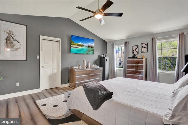 3202 Nash Rd, Reading, PA 19608 - bedroom featuring wood finished floors, lofted ceiling, baseboards, and a ceiling fan