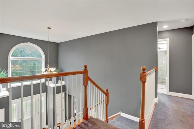 3202 Nash Rd, Reading, PA 19608 - stairs featuring carpet flooring, a chandelier, and baseboards