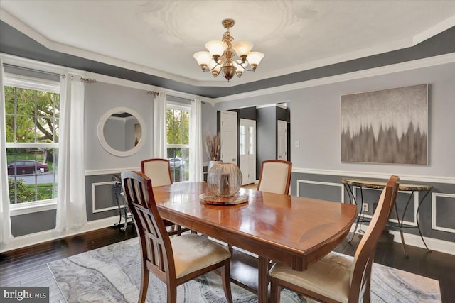 3202 Nash Rd, Reading, PA 19608 - dining area with a chandelier, a tray ceiling, a wainscoted wall, and wood finished floors