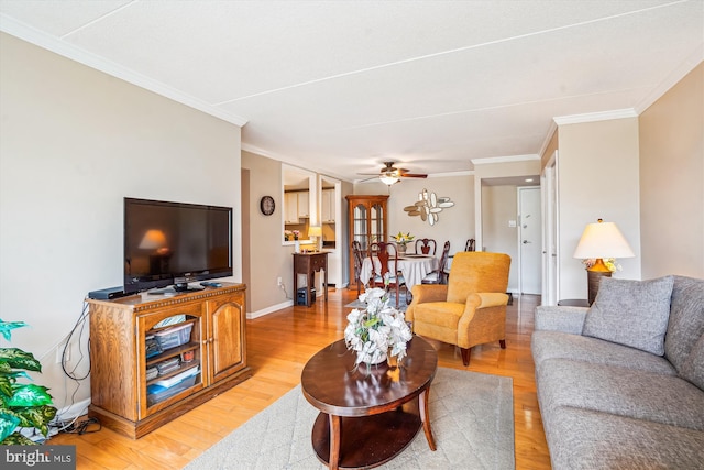 6300 Stevenson Ave Unit 523, Alexandria, VA 22304 - living area featuring light wood-style floors, ornamental molding, baseboards, and a ceiling fan