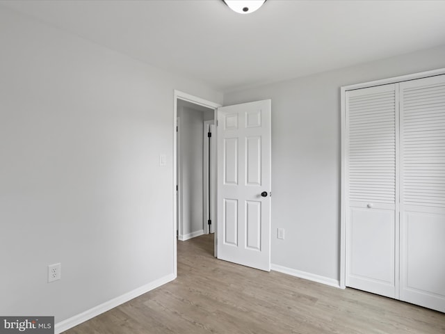 230 Allison Ave, Winchester, VA 22601 - unfurnished bedroom featuring light wood finished floors and a closet