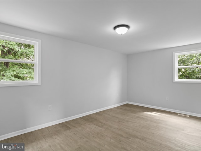 230 Allison Ave, Winchester, VA 22601 - spare room featuring healthy amount of natural light and wood finished floors