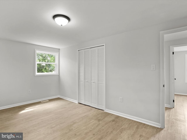 230 Allison Ave, Winchester, VA 22601 - unfurnished bedroom featuring light wood finished floors and a closet