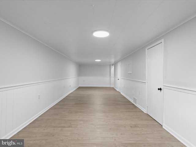 230 Allison Ave, Winchester, VA 22601 - empty room featuring light wood-type flooring, wainscoting, and a decorative wall