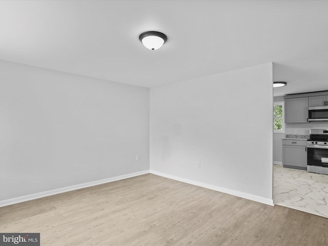230 Allison Ave, Winchester, VA 22601 - empty room with baseboards and light wood-type flooring