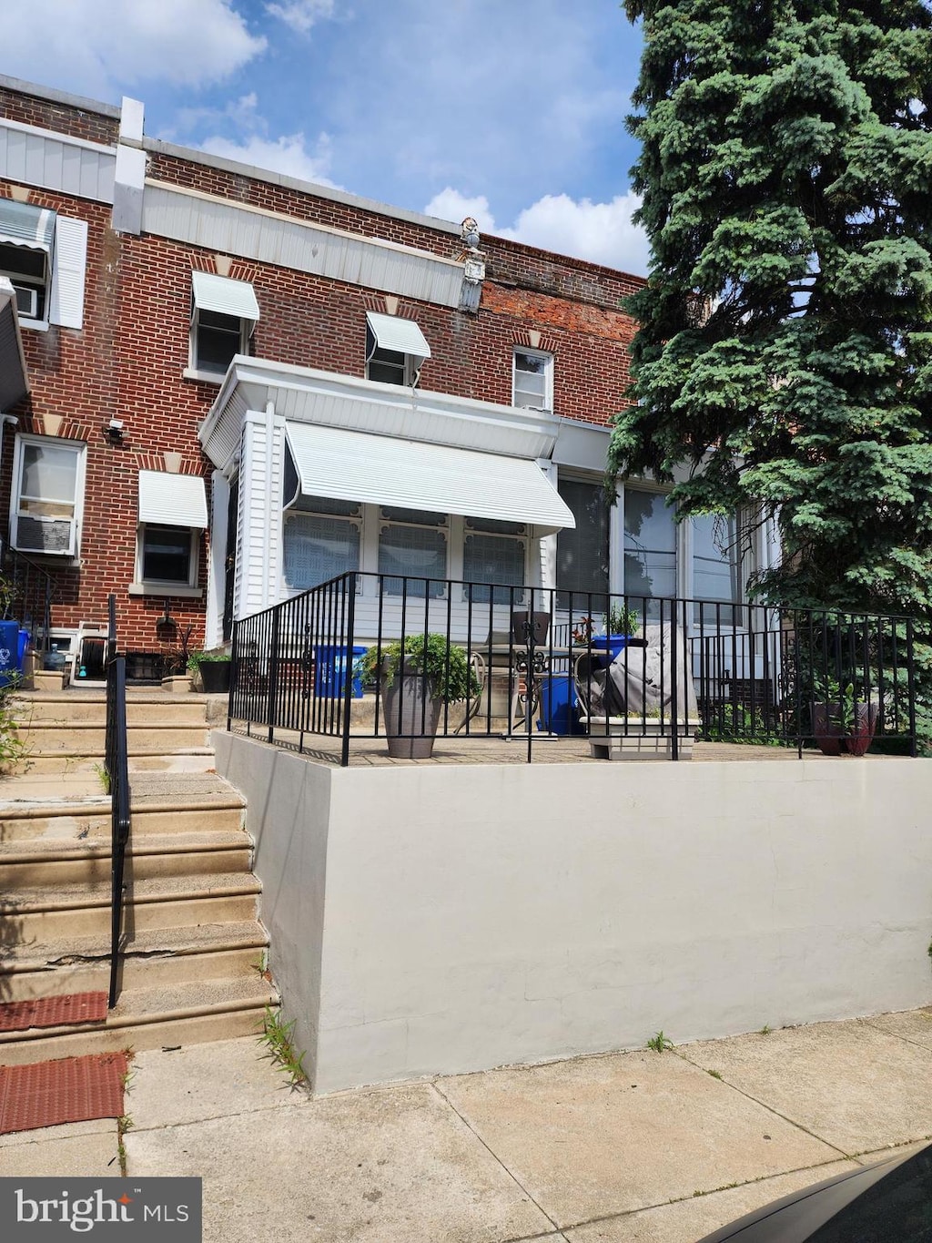 1327 S 56th St, Philadelphia, PA 19143 - view of property featuring fence