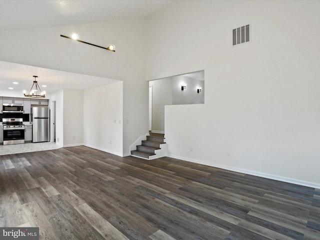 143 Zinn Way, Linden, VA 22642 - unfurnished living room featuring high vaulted ceiling, dark wood-style floors, a chandelier, and stairs